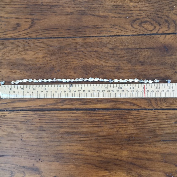 Brown, tan, and white shell necklace. - Picture 2 of 2